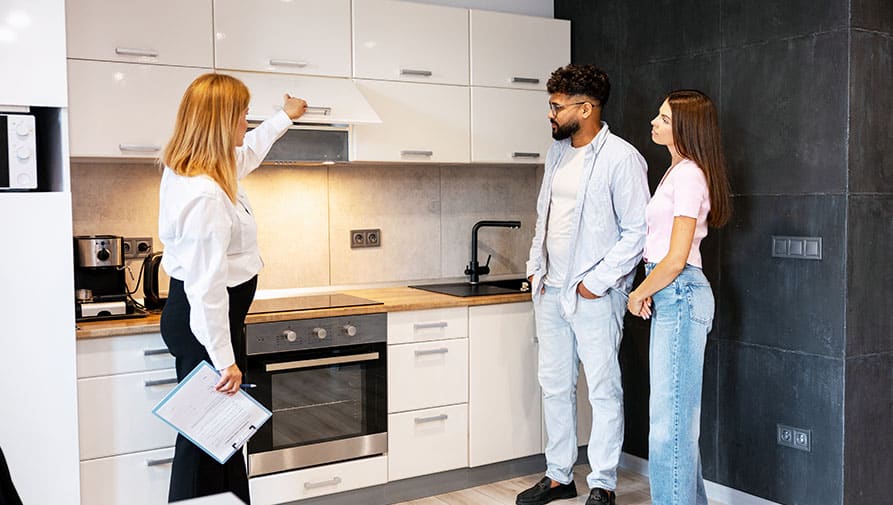 Double checking details in modern kitchen